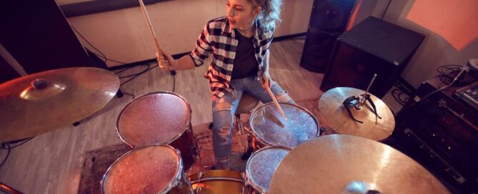 Play Music to Express Your Personality - Girl Playing Drums