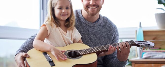 Adult and child music lessons - father with daughter