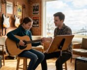 Child getting guitar lessons burlington, ontario